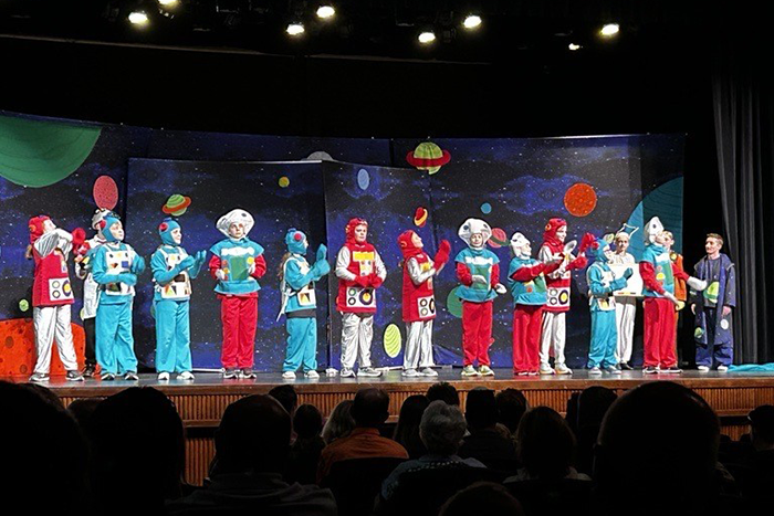 students from Dickinson Catholic Schools performing the show Marya Skaare under the direction of Missoula Children's Theater