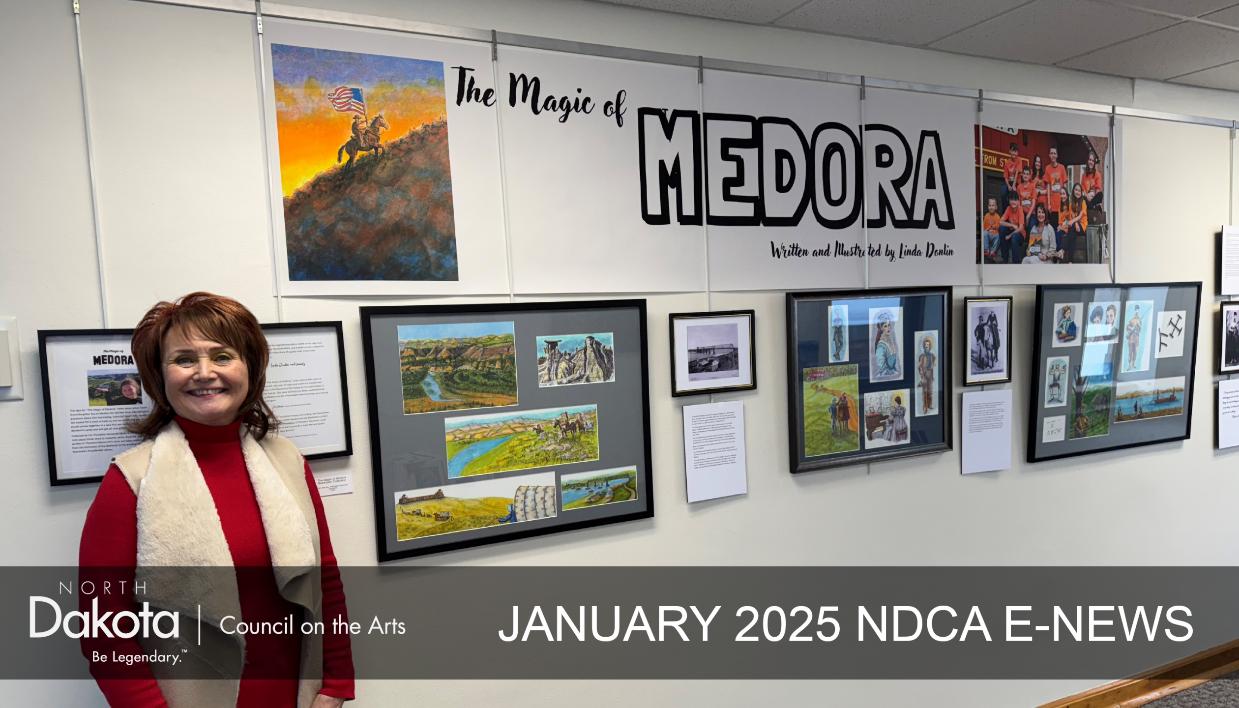 Artist Linda Donlin standing in front of her Medora-themed exhibit on the 18th floor of the Capitol